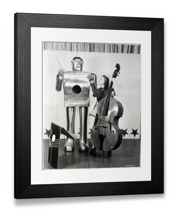 Framed Print : Woman Playing Cello as Robot Conducts Framed Print : Woman Playing Cello as Robot Conducts