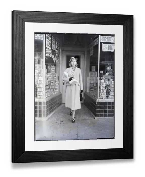 Framed Print : Young Woman Coming Out Of Grocery Framed Print : Young Woman Coming Out Of Grocery