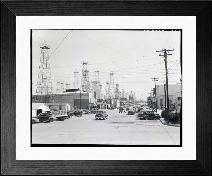 Framed Print : Clusters Of Oil Derricks Along Street Framed Print : Clusters Of Oil Derricks Along Street