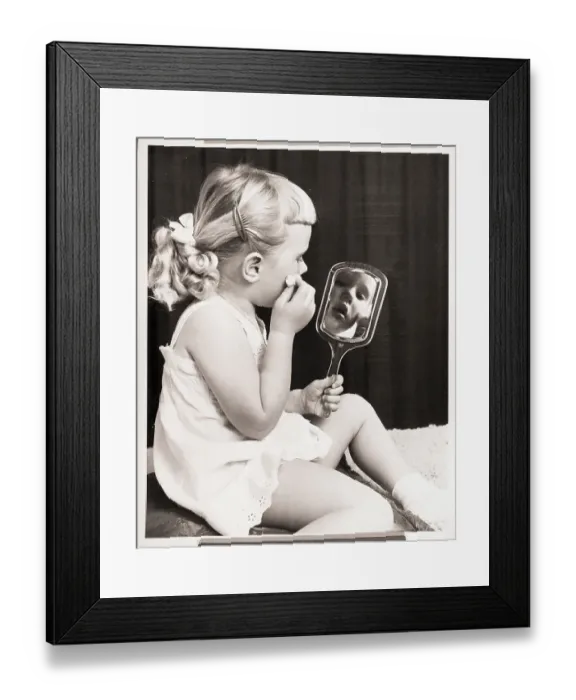 Framed Print : Girl Holding a Mirror Framed Print : Girl Holding a Mirror