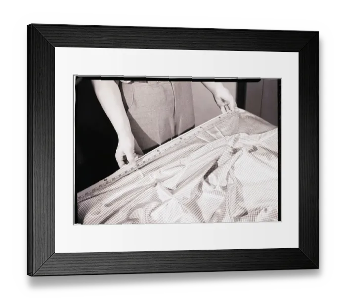 Framed Print : Man Measuring Cloth With Yardstick Framed Print : Man Measuring Cloth With Yardstick