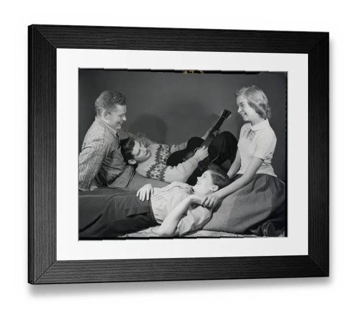 Framed Print : Teenagers Listening To Guitar Framed Print : Teenagers Listening To Guitar