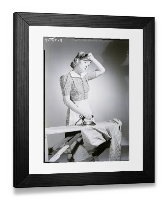 Framed Print : Woman Hard at Work Ironing Framed Print : Woman Hard at Work Ironing