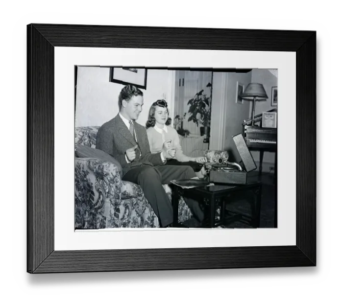 Framed Print : Man, Woman Listen To Phonograph Framed Print : Man, Woman Listen To Phonograph