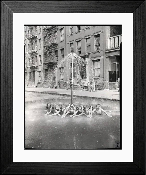 Framed Print : Children Lying Under a Sprinkler on a Hot Day Framed Print : Children Lying Under a Sprinkler on a Hot Day