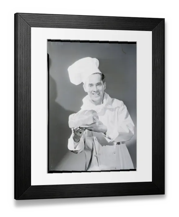 Framed Print : Baker Holding Bread Framed Print : Baker Holding Bread