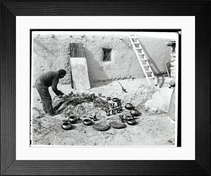 Framed Print : San Ildefonso Indian Examining Pottery Framed Print : San Ildefonso Indian Examining Pottery