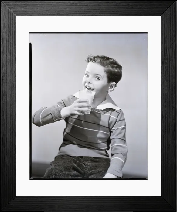Framed Print : Smiling Boy with a Glass of Milk