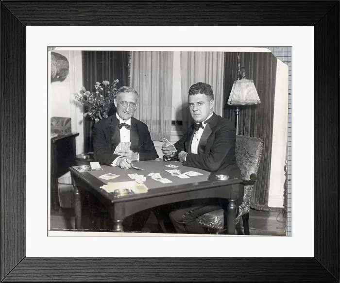 Framed Print : Two Men Seated At A Table Playing Cards Framed Print : Two Men Seated At A Table Playing Cards