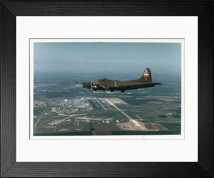 Framed Print : Restored Military Plane In Flight