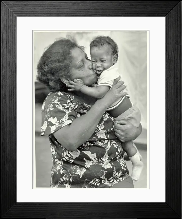 Framed Print : Cuban Grandmother Kissing Her Grandson Framed Print : Cuban Grandmother Kissing Her Grandson