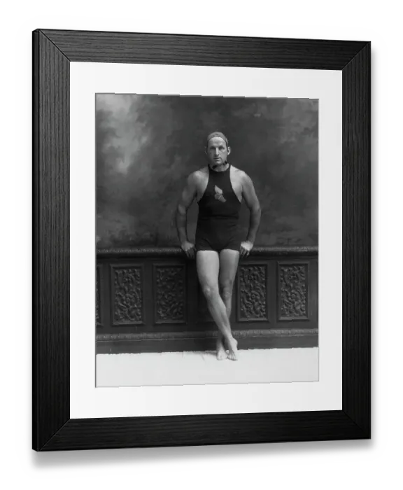 Framed Print : Man in Bathing Suit Leaning Against Wall Framed Print : Man in Bathing Suit Leaning Against Wall