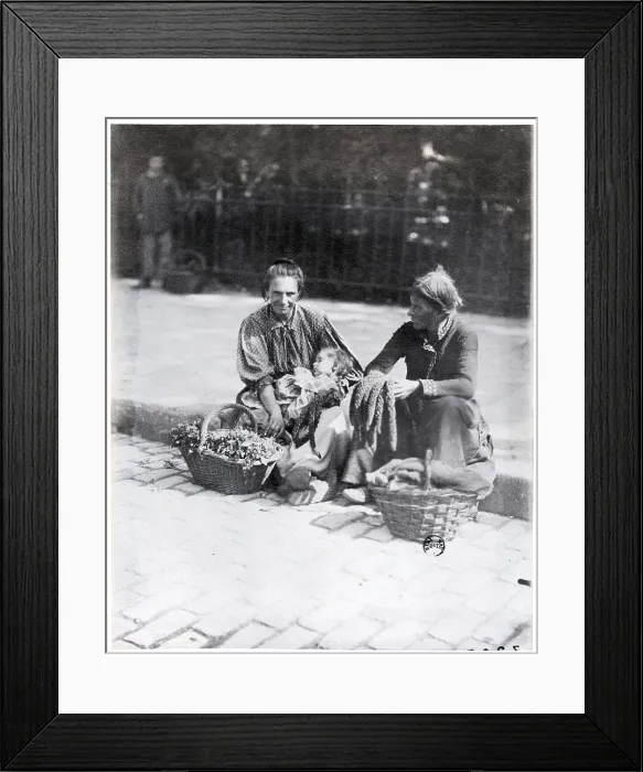 Framed Print : Two Women And Child Sitting On Curb Framed Print : Two Women And Child Sitting On Curb