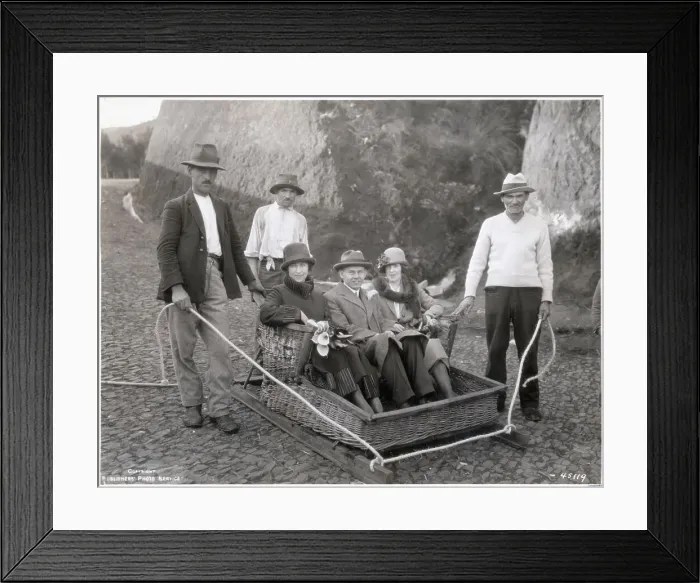Framed Print : Three People Seated In Wicker Tobaggan Framed Print : Three People Seated In Wicker Tobaggan