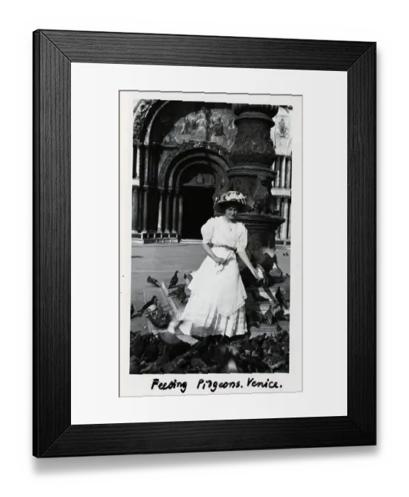 Framed Print : Woman in White Dress Feeding Pigeons Framed Print : Woman in White Dress Feeding Pigeons