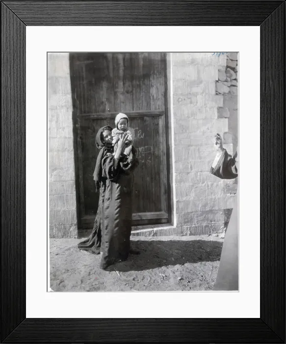 Framed Print : Woman Holding up Her Child on Street Framed Print : Woman Holding up Her Child on Street