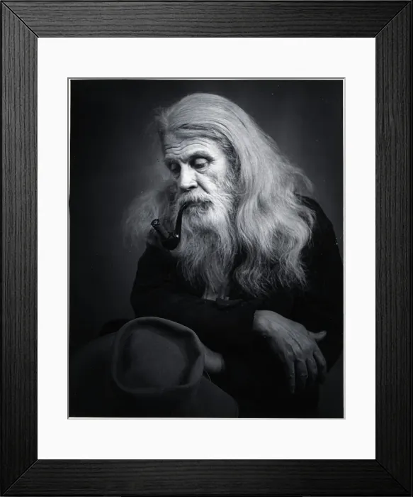 Framed Print : Elderly Man Smoking Cigar In Pipe Framed Print : Elderly Man Smoking Cigar In Pipe