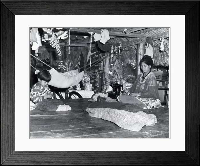 Framed Print : Seminole Woman Sewing In Hut; Child