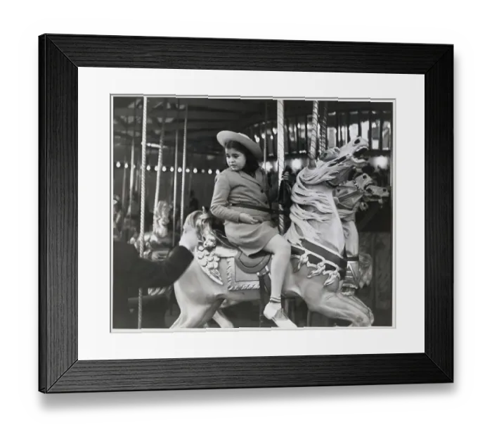 Framed Print : Girl Riding Carousel Horse Framed Print : Girl Riding Carousel Horse