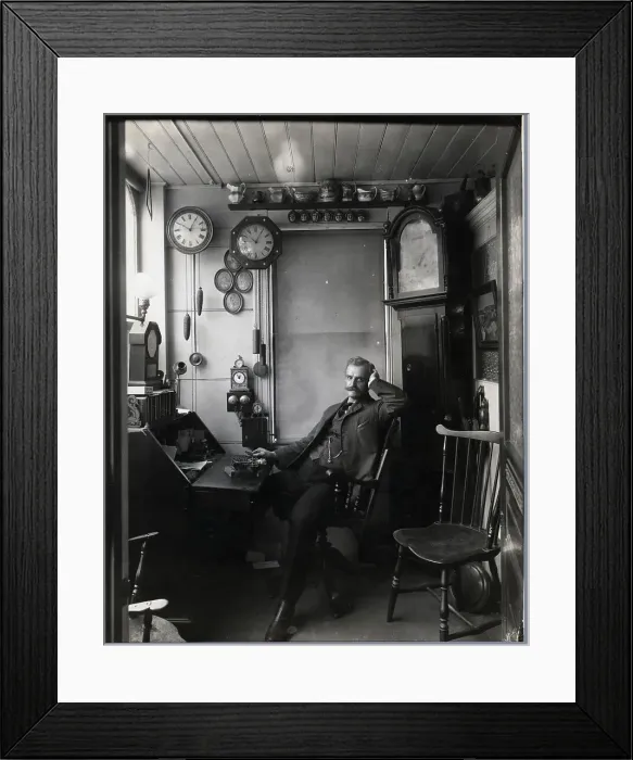 Framed Print : Clock Maker Seated In His Shop Framed Print : Clock Maker Seated In His Shop