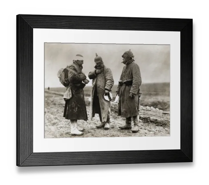 Framed Print : German Soldiers Study War Medals Framed Print : German Soldiers Study War Medals