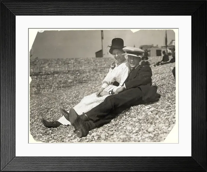 Framed Print : Young Couple Trading Hats Framed Print : Young Couple Trading Hats
