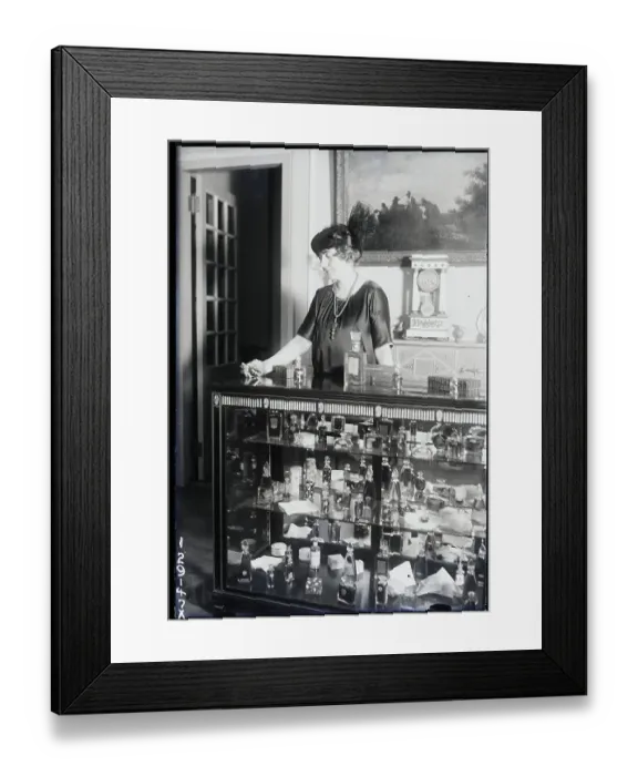 Framed Print : Woman Working At Perfume Counter Framed Print : Woman Working At Perfume Counter