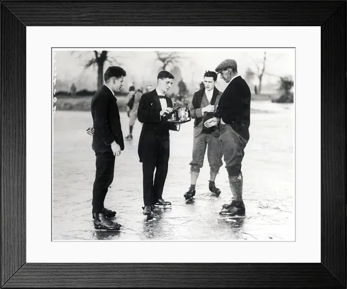 Framed Print : Men Served Drinks While Ice Skating Framed Print : Men Served Drinks While Ice Skating
