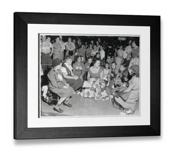 Framed Print : Woman Speaks To Girl Scouts