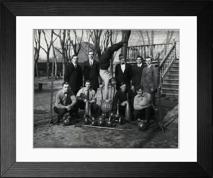 Framed Print : Group Of Men Posing Around Barbells Framed Print : Group Of Men Posing Around Barbells
