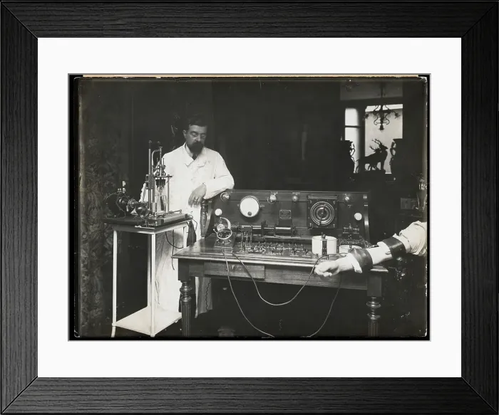 Framed Print : Doctor Using a Rheostat