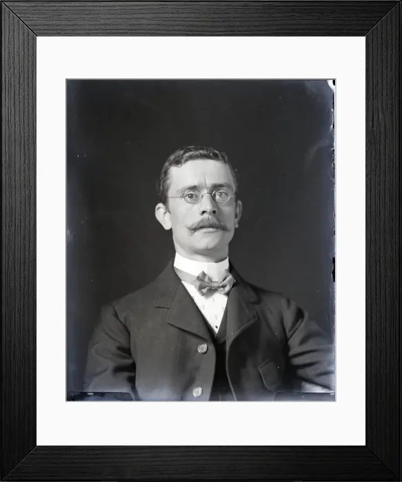Framed Print : Man Wearing Glasses And Stern Expression Framed Print : Man Wearing Glasses And Stern Expression