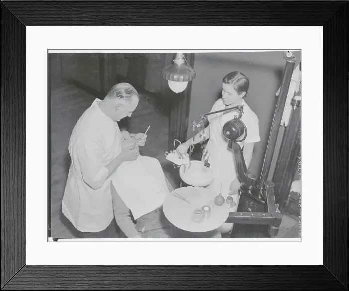 Framed Print : Dentists Working on Patient Framed Print : Dentists Working on Patient