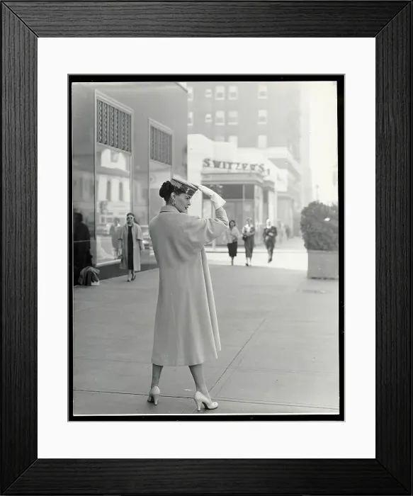 Framed Print : Woman Modeling Hand-Tailored Coat Framed Print : Woman Modeling Hand-Tailored Coat