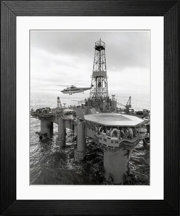 Framed Print : Helicopter Above Offshore Drilling Rig