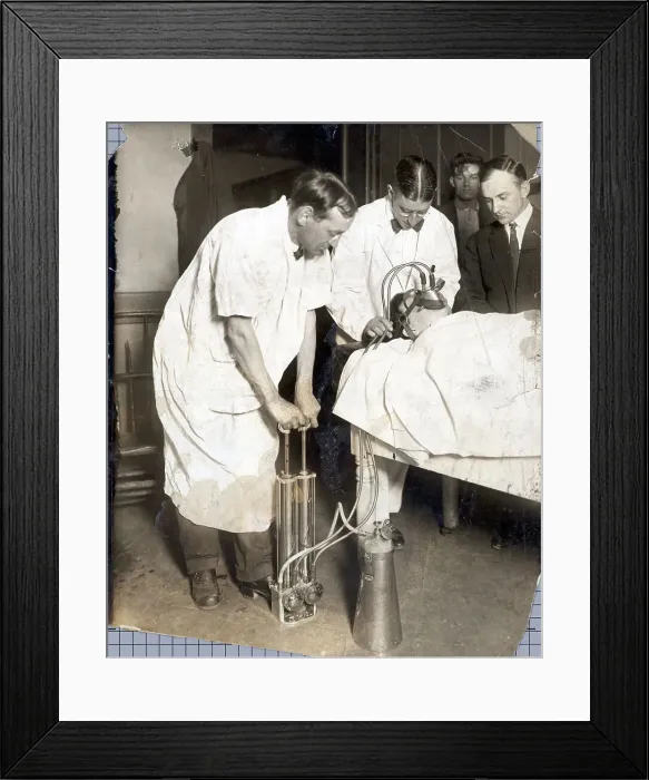 Framed Print : Men Reviving Man With Oxygen Pump