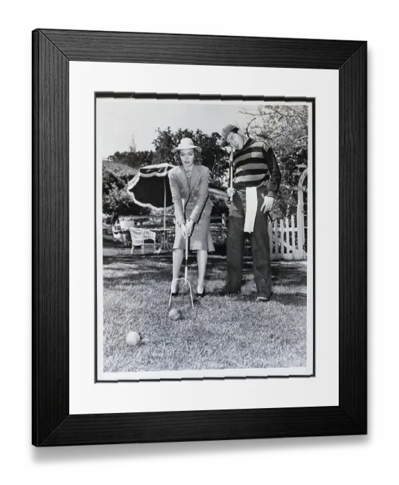 Framed Print : Woman Beating Man in a Game of Croquet Framed Print : Woman Beating Man in a Game of Croquet