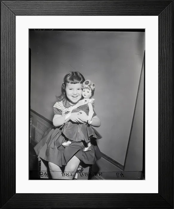 Framed Print : Girl Playing With Doll Framed Print : Girl Playing With Doll