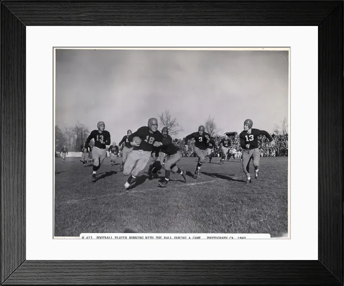 Framed Print : Football Player Running With Ball Framed Print : Football Player Running With Ball