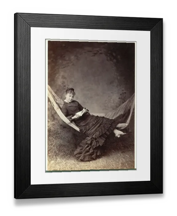 Framed Print : Woman Relaxing in Hammock with Book Framed Print : Woman Relaxing in Hammock with Book