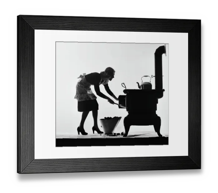 Framed Print : Woman Loading Stove With Coal Framed Print : Woman Loading Stove With Coal