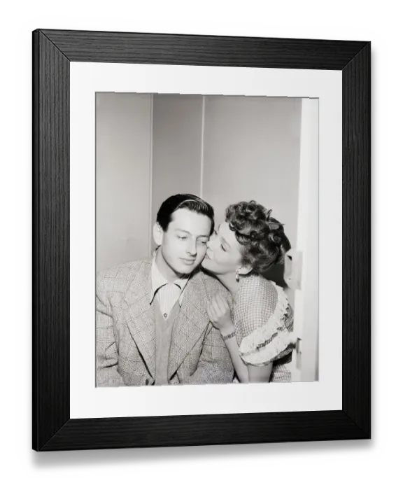 Framed Print : Phyllis Kirk Kissing Young Andre Previn Framed Print : Phyllis Kirk Kissing Young Andre Previn