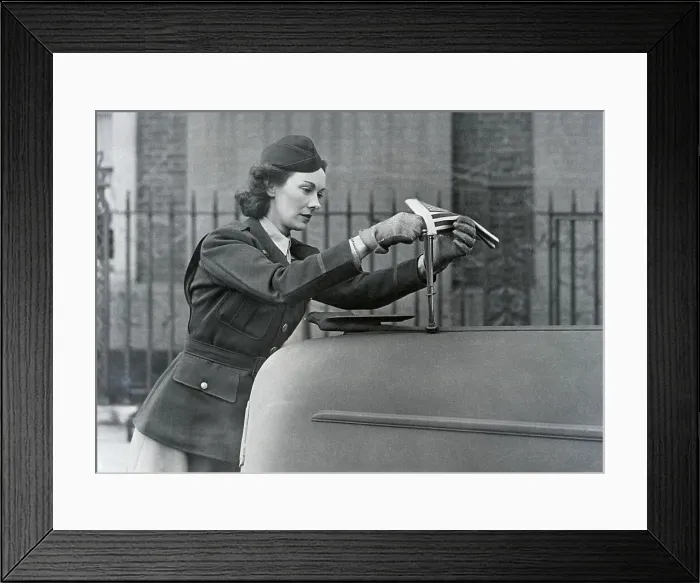 Framed Print : Kay Summersby Putting Flag On Car Framed Print : Kay Summersby Putting Flag On Car