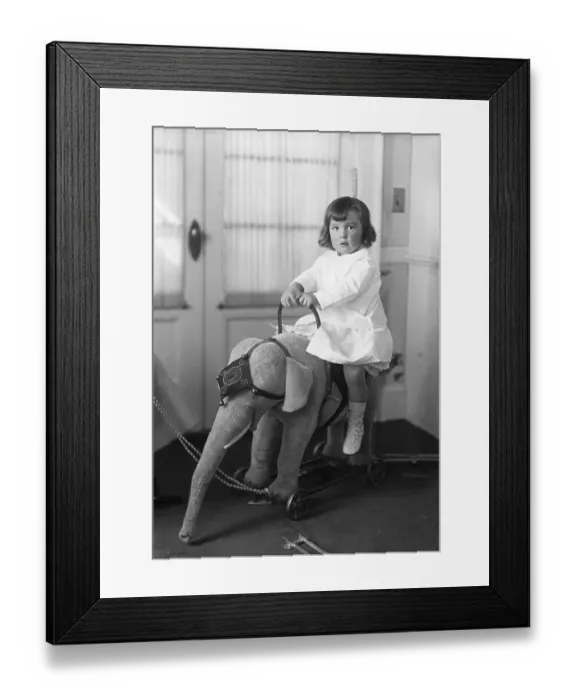 Framed Print : Alfred Gwynne Vanderbilt Playing on a Wheeled Elephant Toy Framed Print : Alfred Gwynne Vanderbilt Playing on a Wheeled Elephant Toy