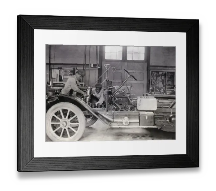Framed Print : Black Mechanics Working On Car In Garage Framed Print : Black Mechanics Working On Car In Garage