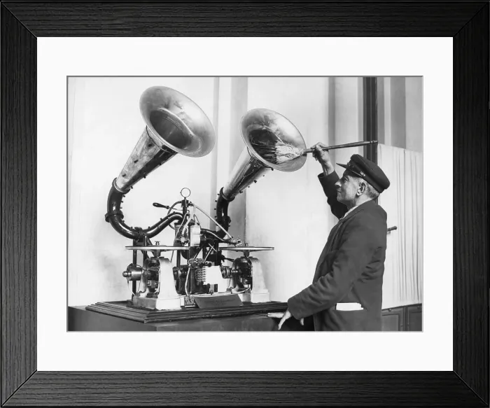 Framed Print : Man Dusting Gramophone Framed Print : Man Dusting Gramophone