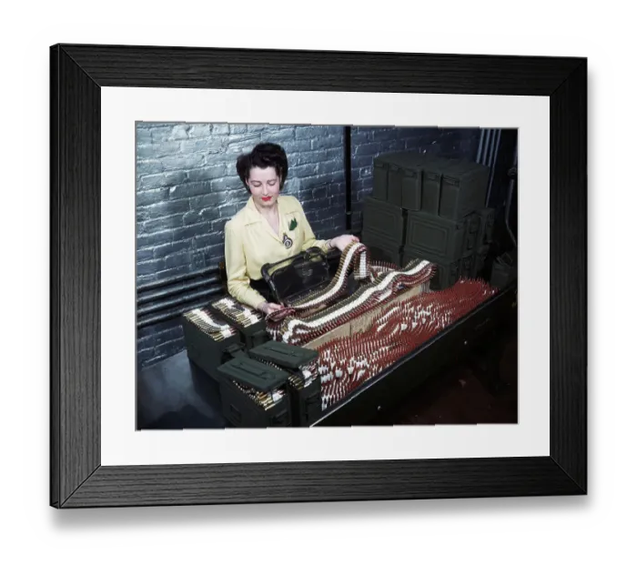Framed Print : Female Worker Inspects Gun Bullets Framed Print : Female Worker Inspects Gun Bullets
