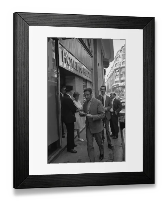 Framed Print : Man Walking Away from French Hotel Framed Print : Man Walking Away from French Hotel