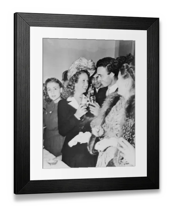 Framed Print : Danielle Darrieux Toasting with Husband Framed Print : Danielle Darrieux Toasting with Husband