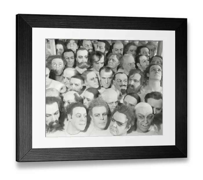 Framed Print : L. E. Cates Surrounded by Wax Heads